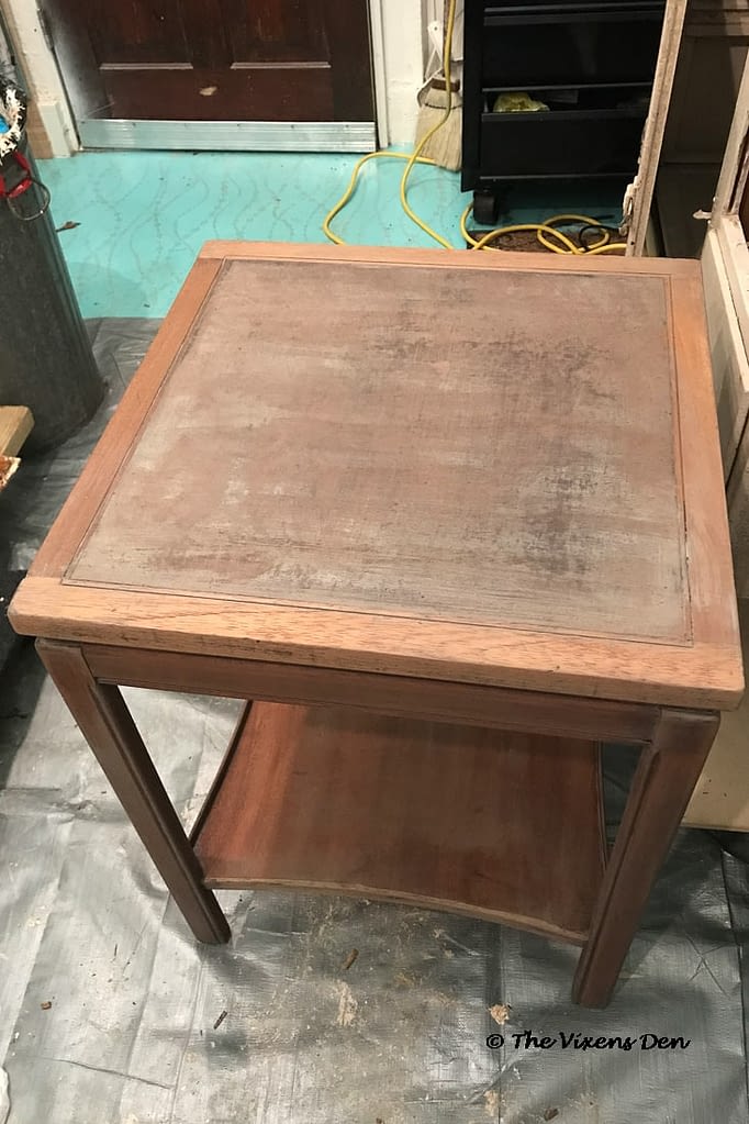 cherry side table after finish is removed and one coat of Minmwax color wash is applied