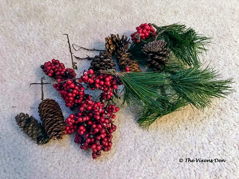 pinecone, pine, and red berry picks