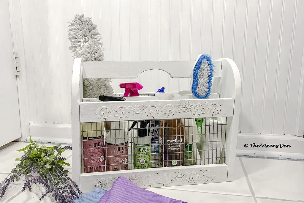 repurposed magazine rack staged as a cleaning caddy