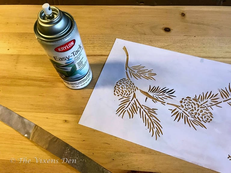 krylon easy-tack spray adhesive and a pine bough stencil